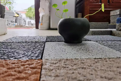 五颜六色的地面艺术 仿花岗岩透水彩砖引领市政园林铺装新潮流